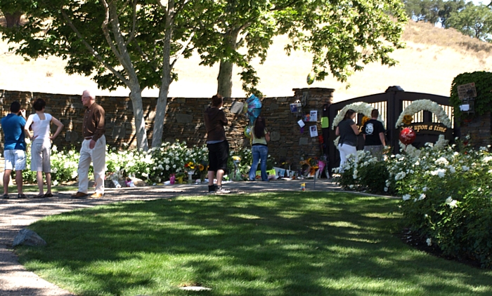Fans gathered with flowers at the Neverland Ranch gates in 2009