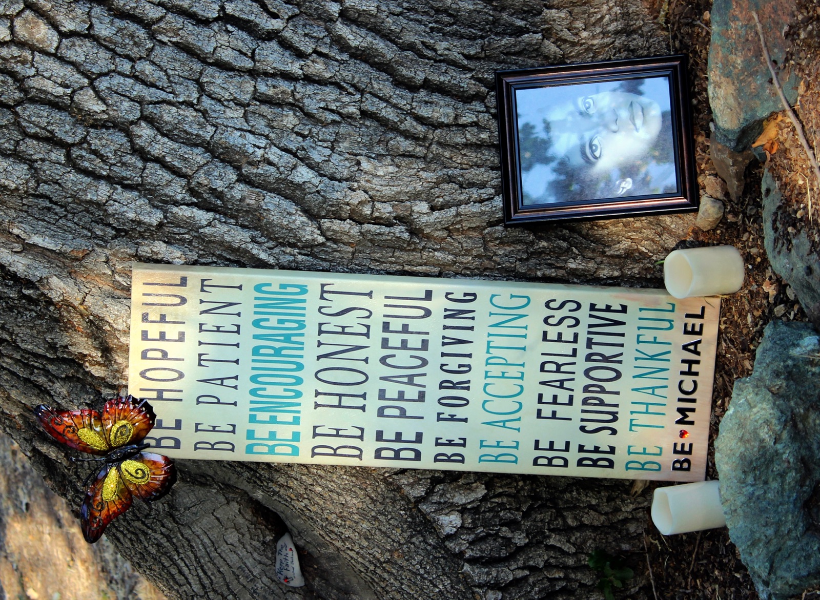 A fan's tribute sign reading 'Be hopeful, be patient... Be Michael' left at Neverland